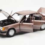Mercedes 230E W124 Rosewood Metallic Händler Edition Norev 1:18 B66040697 - image 2 of 8